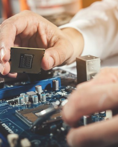 The technician repairing the computer,computer hardware, repairing, upgrade and technology